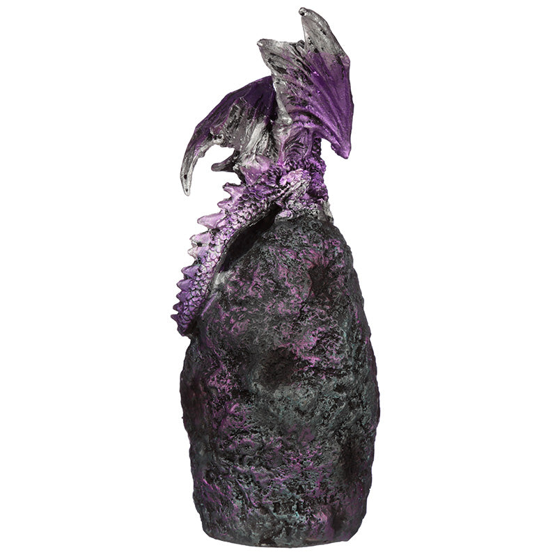 Crystal Cavern LED Dark Legends Dragon Figurine surrounded by collectibles