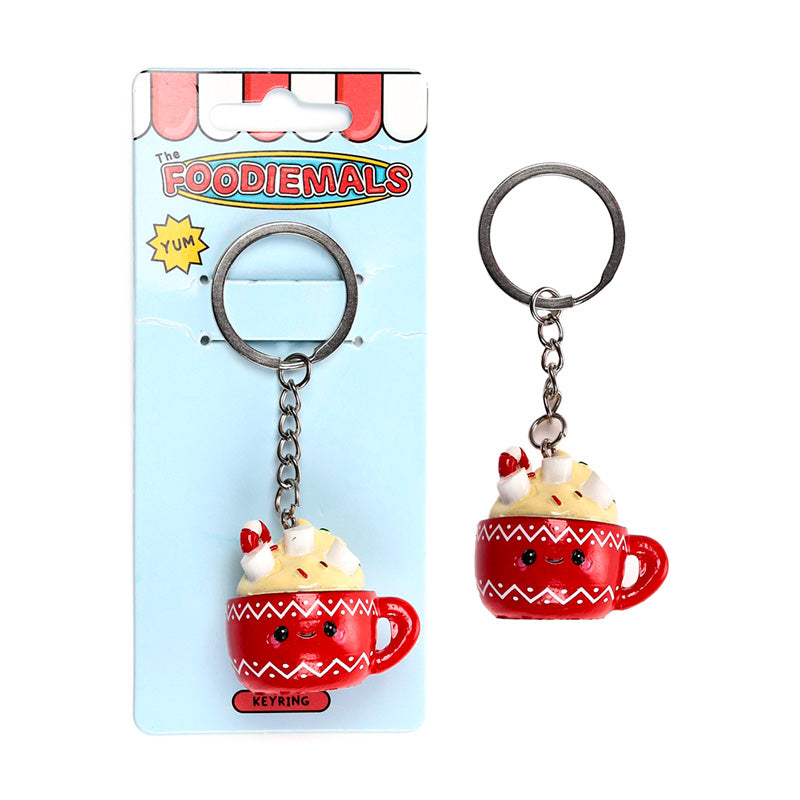 Foodiemals Aspen the Hot Chocolate keyring displayed with other decor