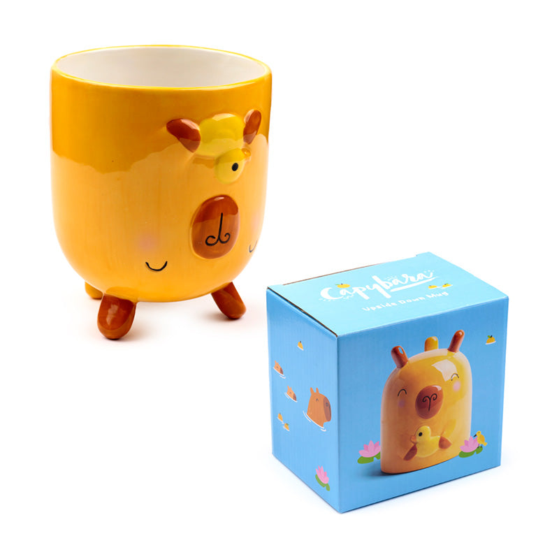 Fun Capybara Mug displayed with other collectibles
