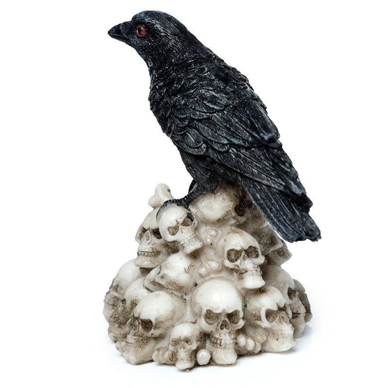 Crow Standing on Pile of Skulls Ornament displayed in home decor