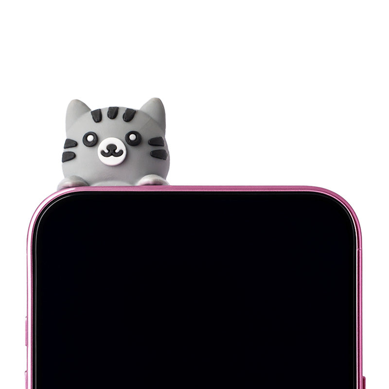 Adoramals PVC Phone Charm on a smartphone