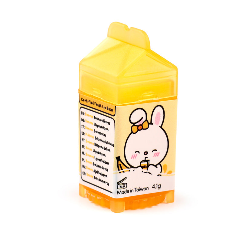 Adoramals Milk Carton Lip Balm in a whimsical holder