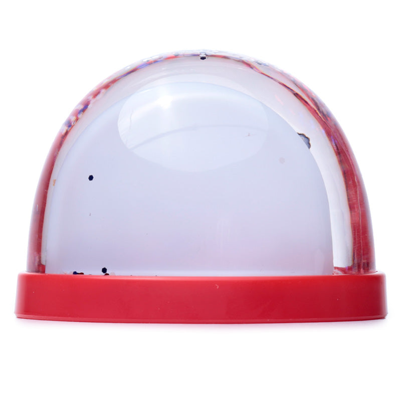 Medium snow globe collectible featuring London icons