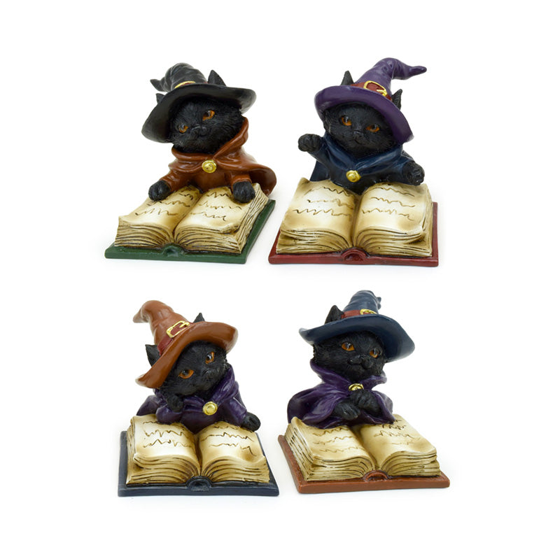 Witches Cat reading from a magical spell book ornament