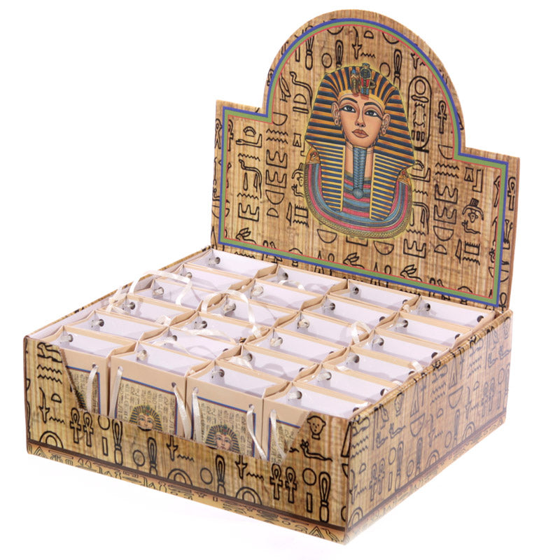 Collectible Gold Egyptian Icon Trinket in a decorative setting