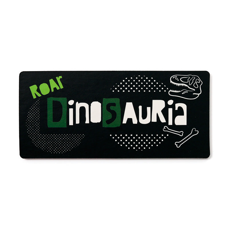Kids enjoying a fun game with Dinosauria dominoes