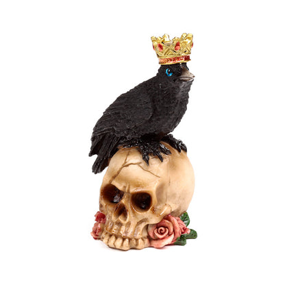 Regal crow ornament with skulls for display