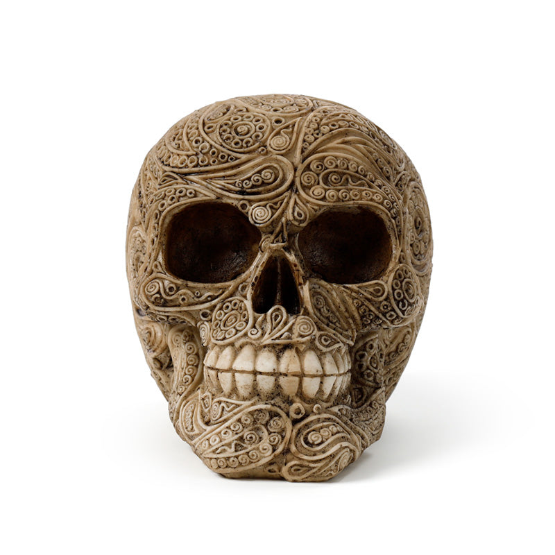 Close-up of the intricate damask pattern on the skull ornament