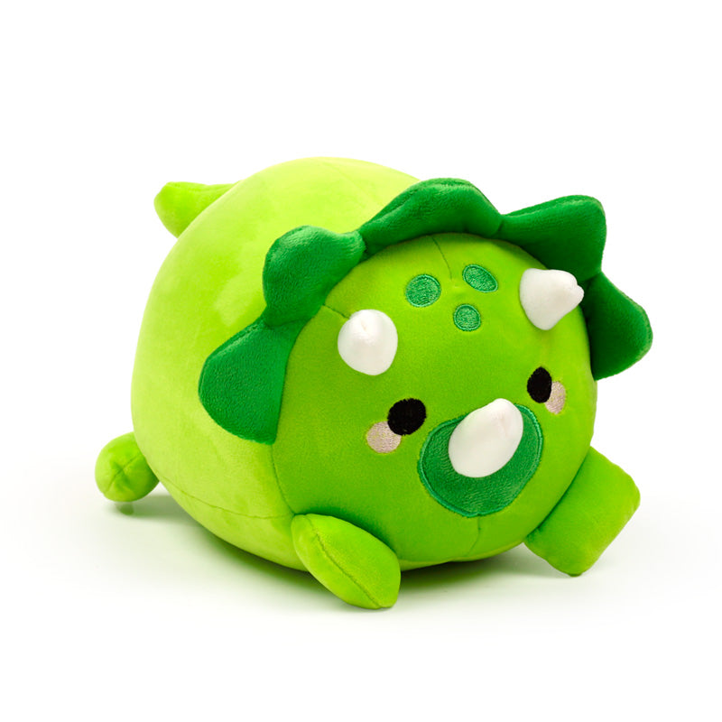 Huck the Dinosaur travel pillow in plush form