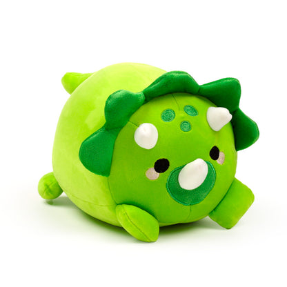 Huck the Dinosaur travel pillow in plush form