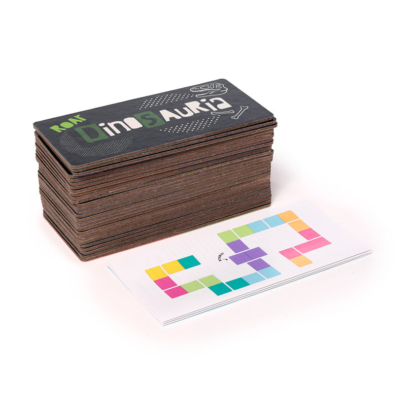 Colorful Dinosauria domino set displayed on a table