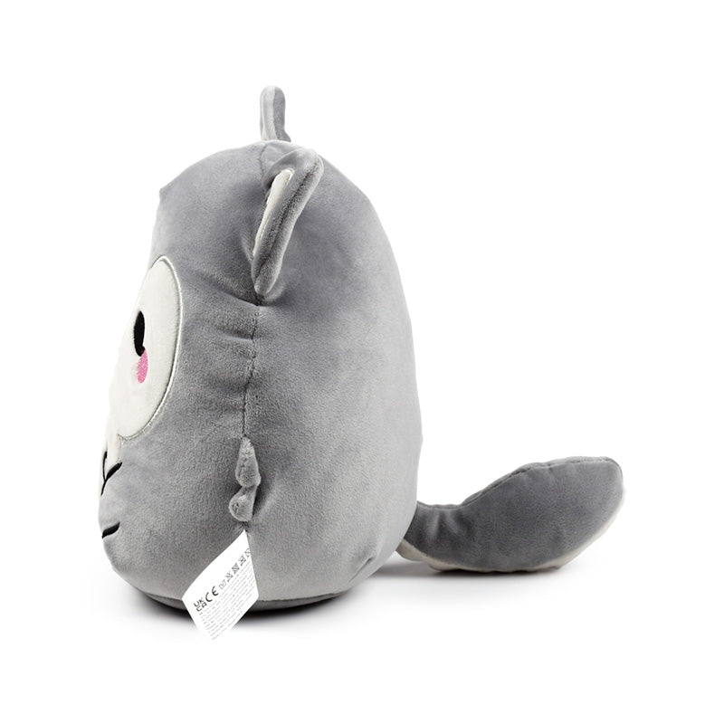 Dorian the Wolf plush toy in a cozy home setting