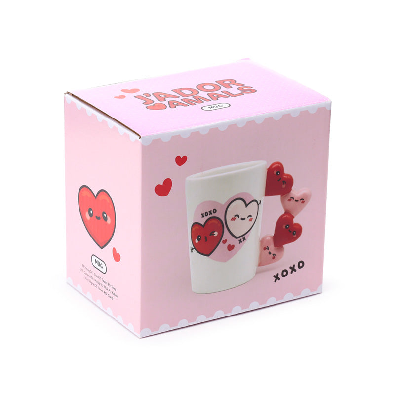 Close-up of J'Adoramals Heart XOXO Mug with heart handle