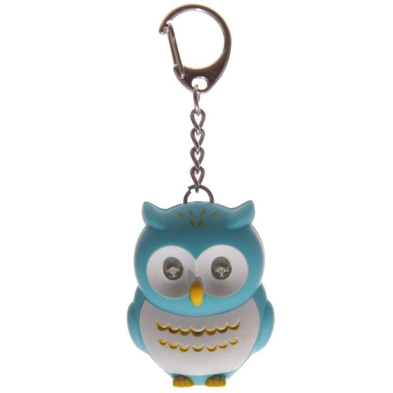 Close-up of the pink and blue hooting owl keyring