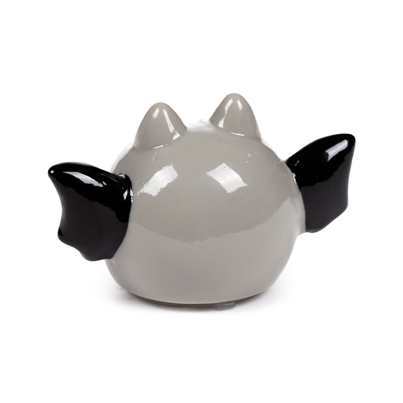 Spooky Bat Lip Balm on a table