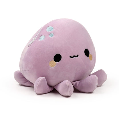 Wendy the Octopus plush toy sitting on a sofa
