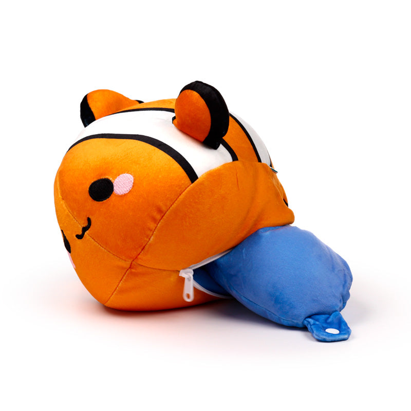 Finley the Clownfish travel pillow in a travel setting
