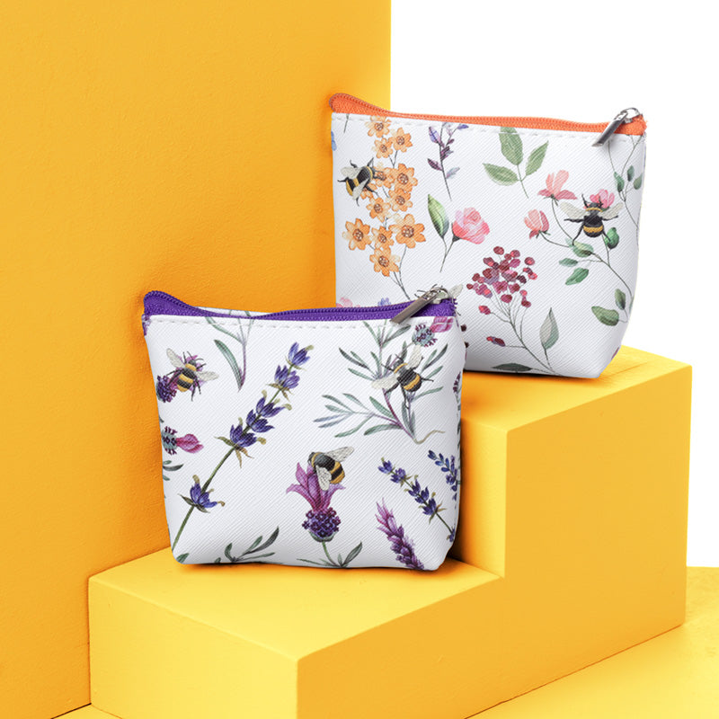 Nectar Meadows PVC Purse in a floral setting