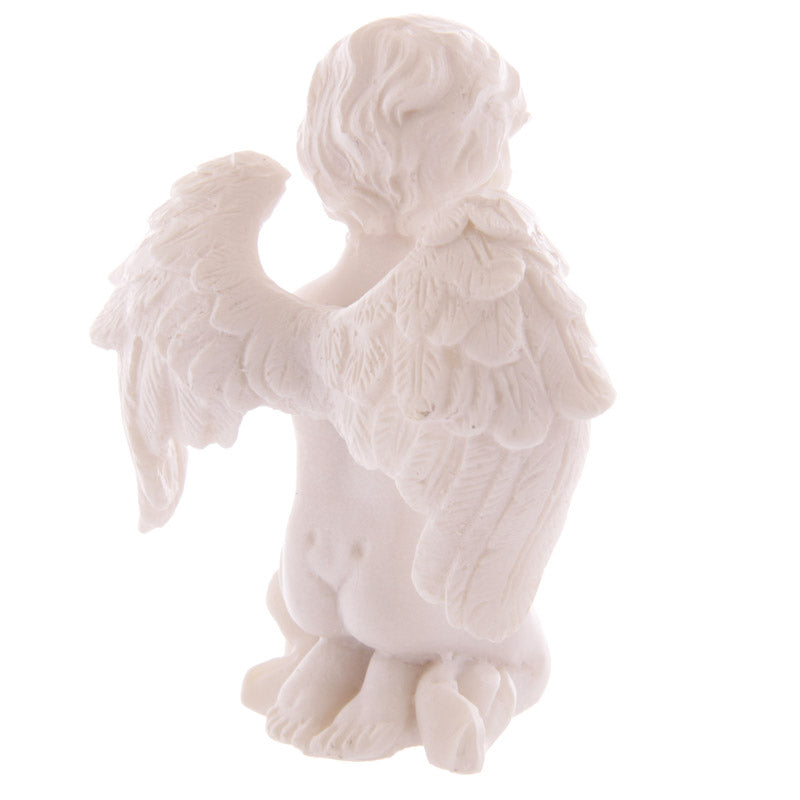 Elegant praying cherub figurine in pastel colours