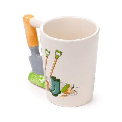 Garden Trowel Shaped Handle Ceramic Mug - Displayed with Plants
