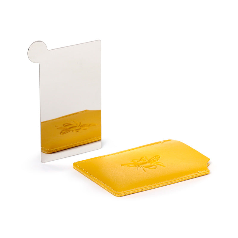 Pocket Mirror Displayed on Dressing Table