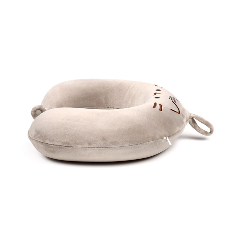 Pusheen the Cat travel pillow in use on a train