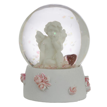 Decorative snow globe with cherub and clouds