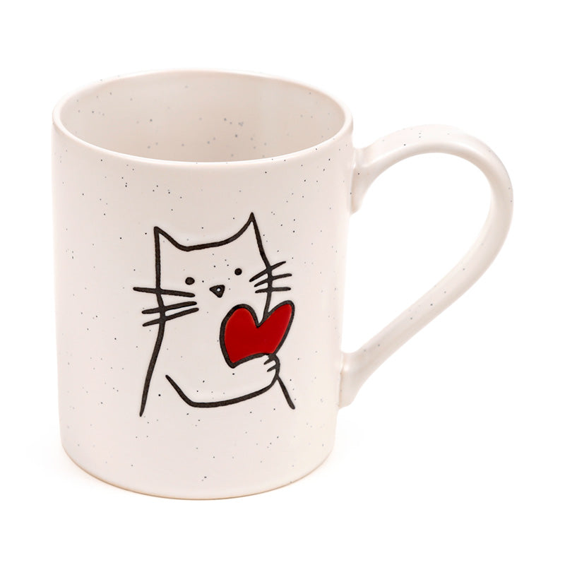 Close-up of the cat design on the stoneware mug