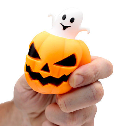 Kids enjoying the Pumpkin Ghost pop-out toy