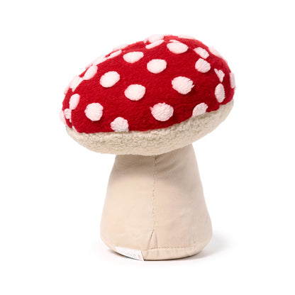 Mushroom plush door stop on wooden floor