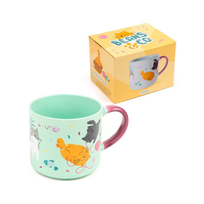 Decorative porcelain mug featuring cat design