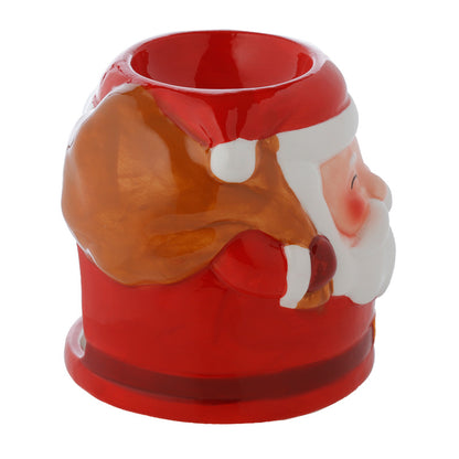 Ceramic Santa Oil Burner displaying warm light