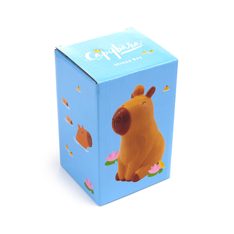 Capybara ceramic money box on a shelf
