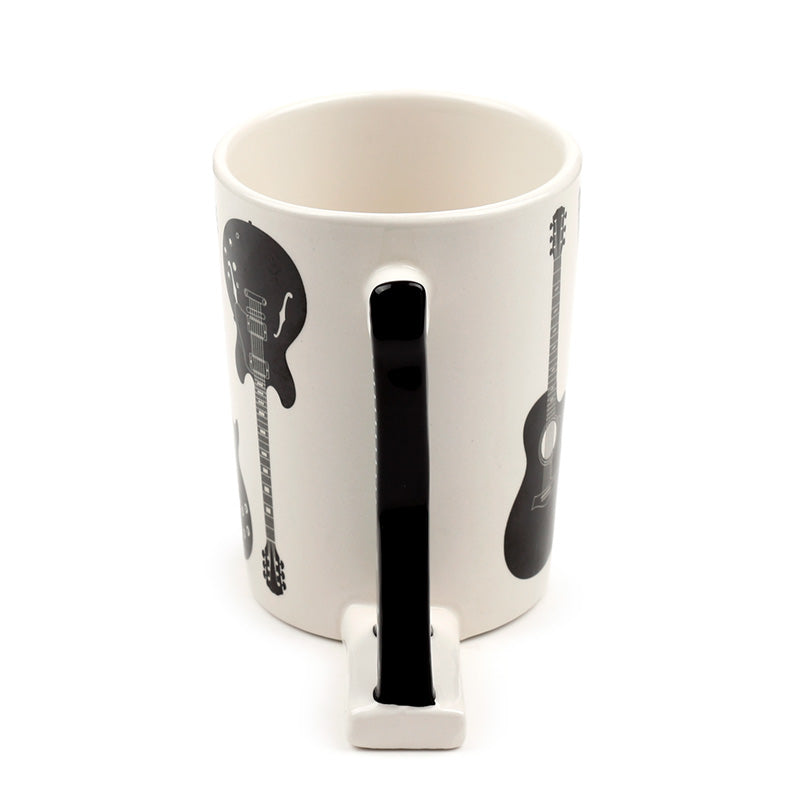Close-up of the guitar handle on ceramic mug