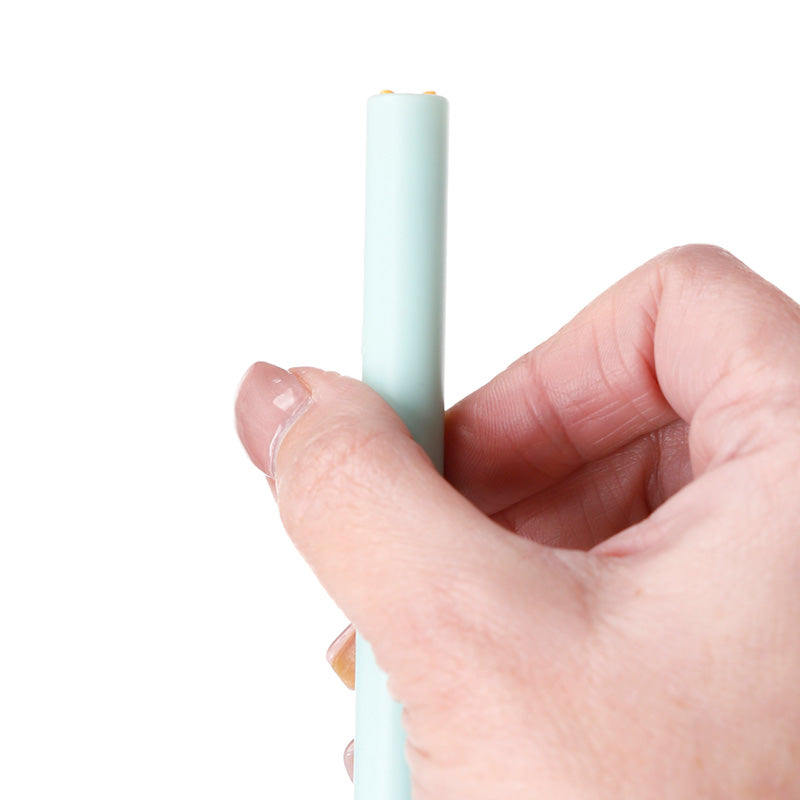 Twist Pop Pet Pen with a collection of stationery