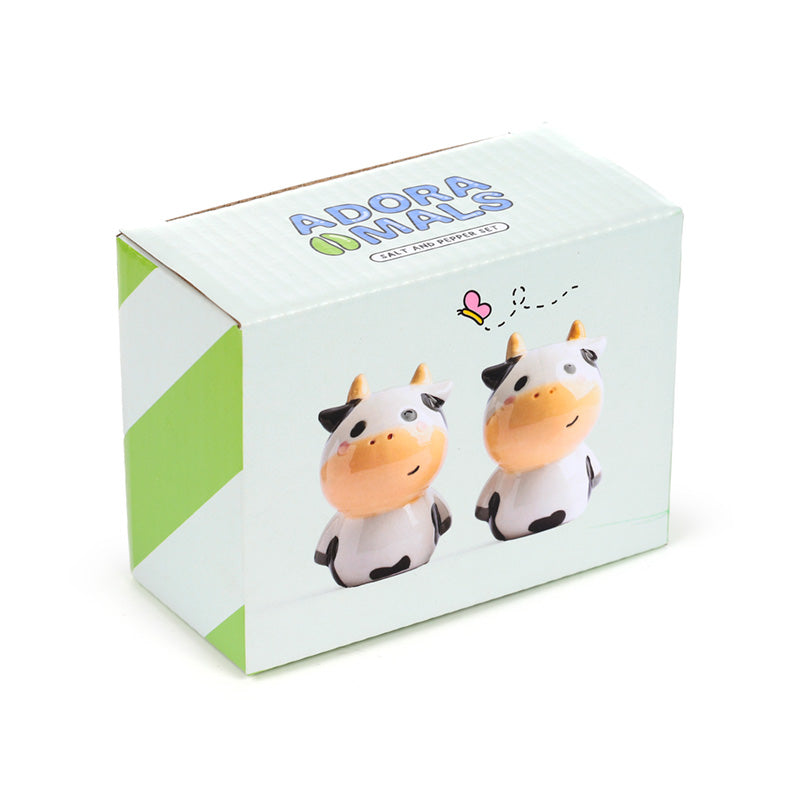 Close-up of the ceramic cow salt and pepper shaker set
