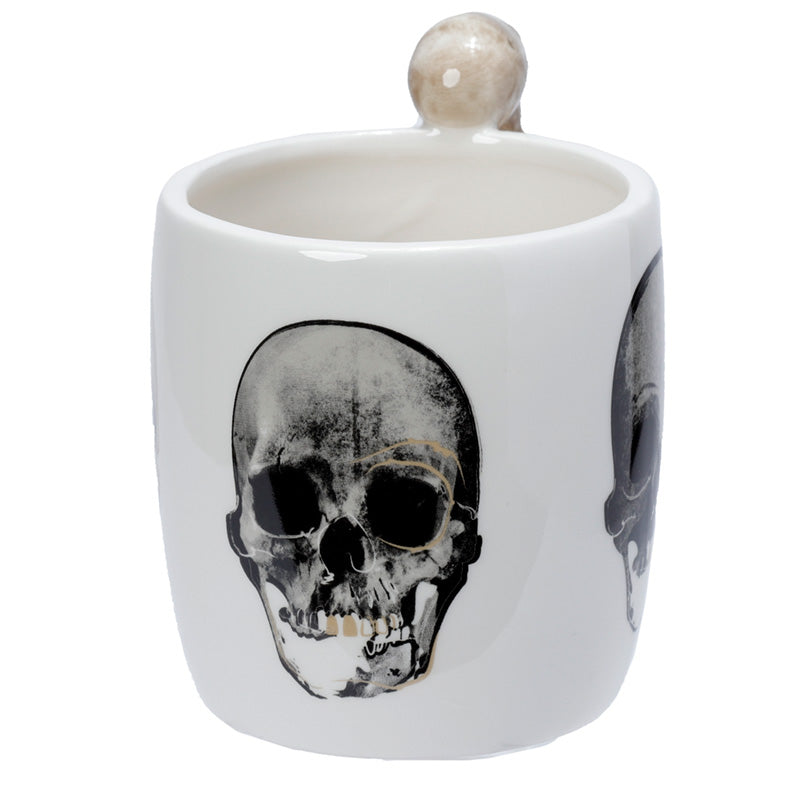 Ceramic mug with unique skeleton handle
