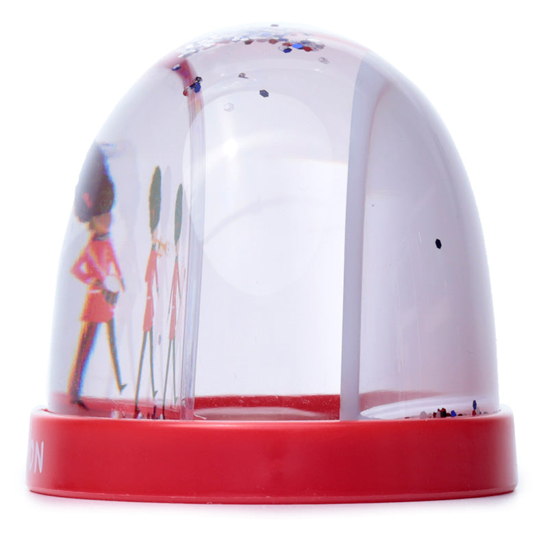 Glittering snow globe of London Guardsmen