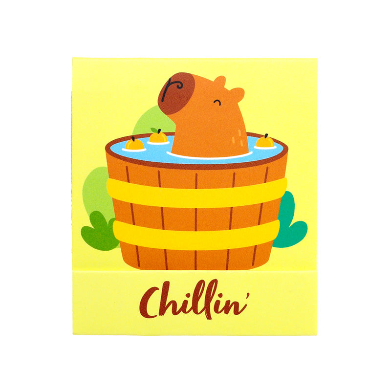 Capybara Nail File Matchbook displayed on vanity