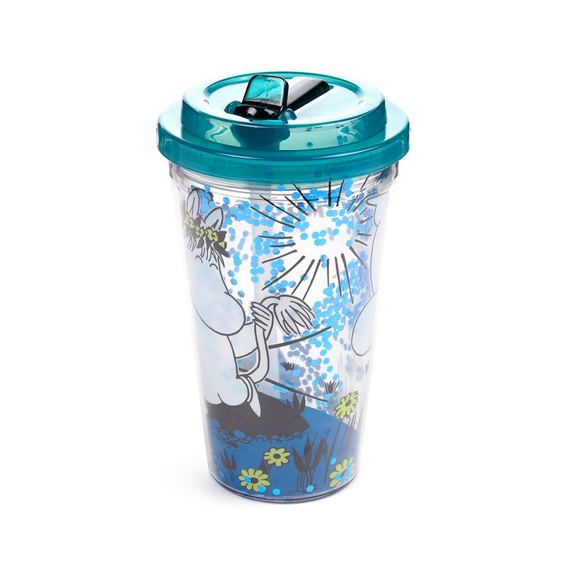 Moomin cup displayed with other home decor items