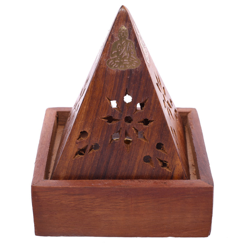 Decorative Sheesham wood incense pyramid box in a serene setting