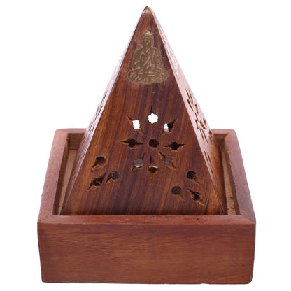 Decorative Sheesham wood incense pyramid box in a serene setting