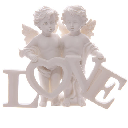 Whimsical cherub couple decorative piece