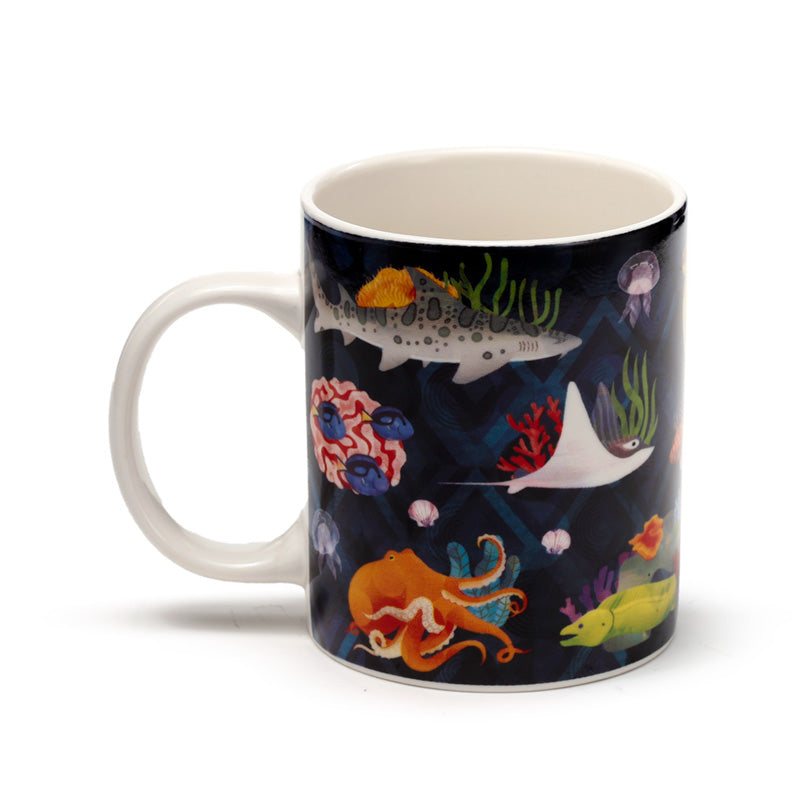 Marine Kingdom Porcelain Mug on a wooden table