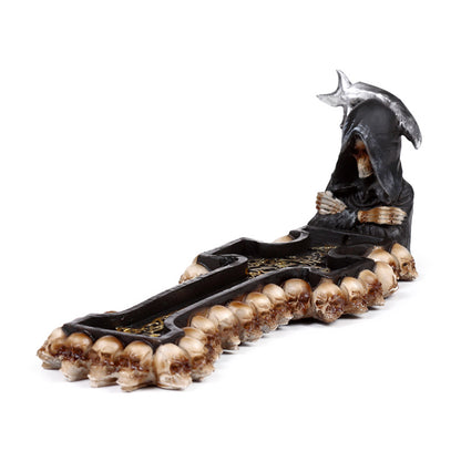 Incense smoke rising from Reaper Death Cross Burner