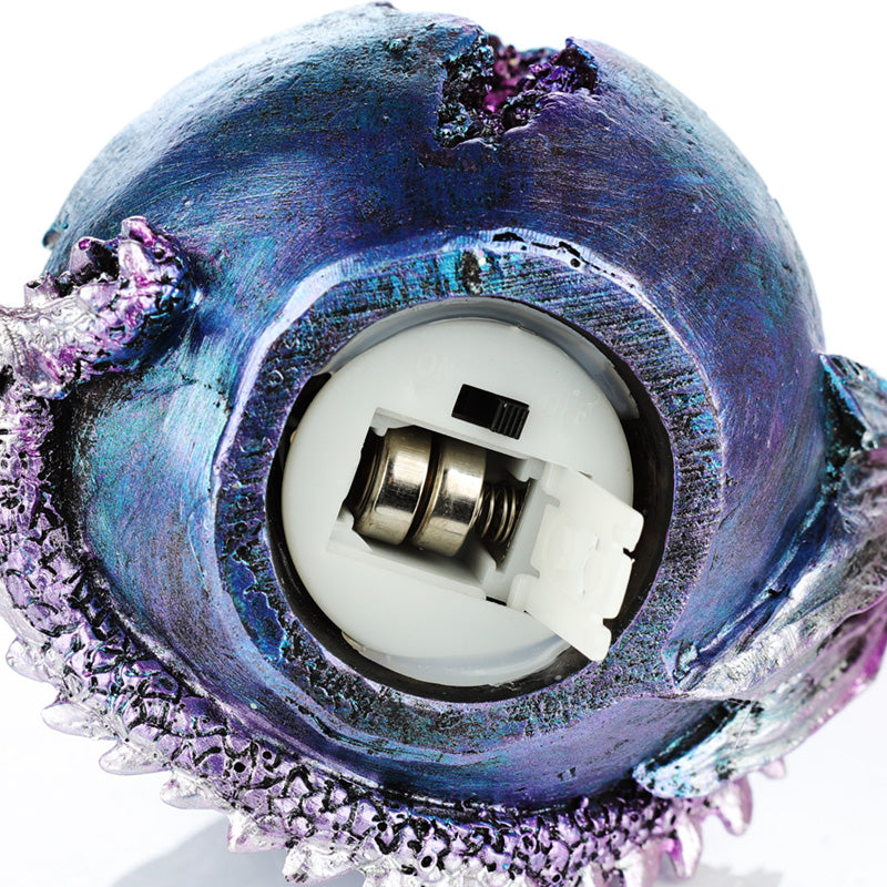 Geode Egg Dragon Figurine displayed on a shelf