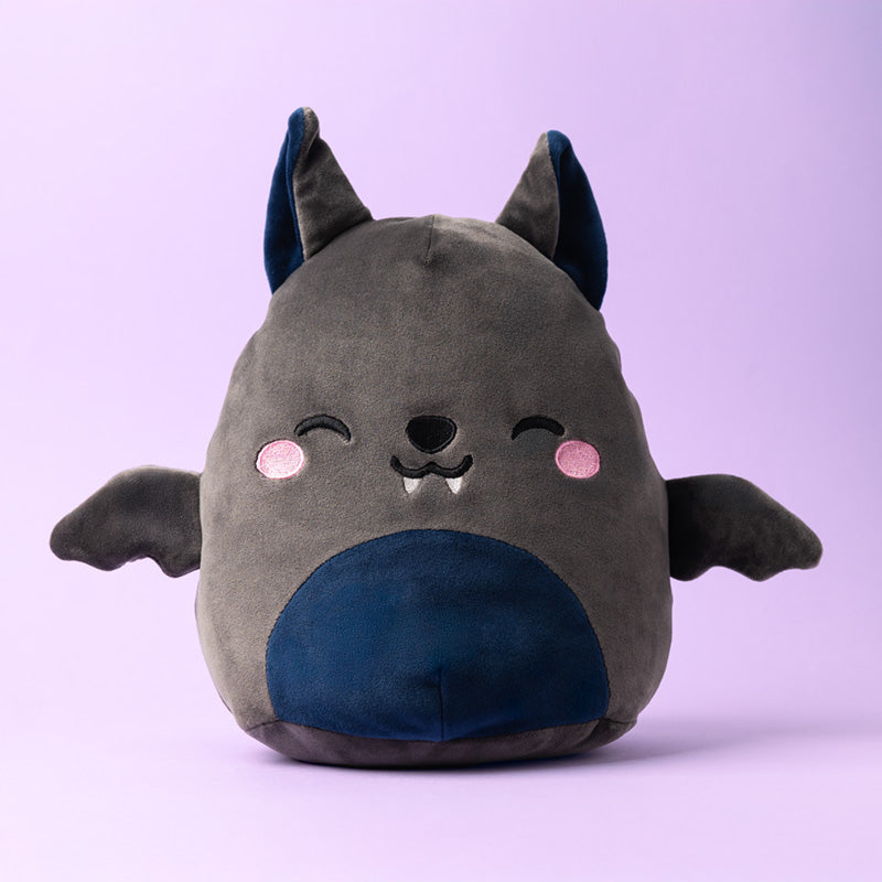 Adoramals Dexter the Bat plush toy in a cozy setting