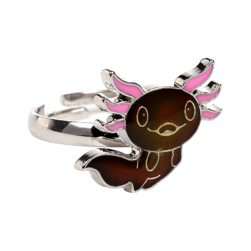 Charming Axolotl Mood Ring displayed on a table