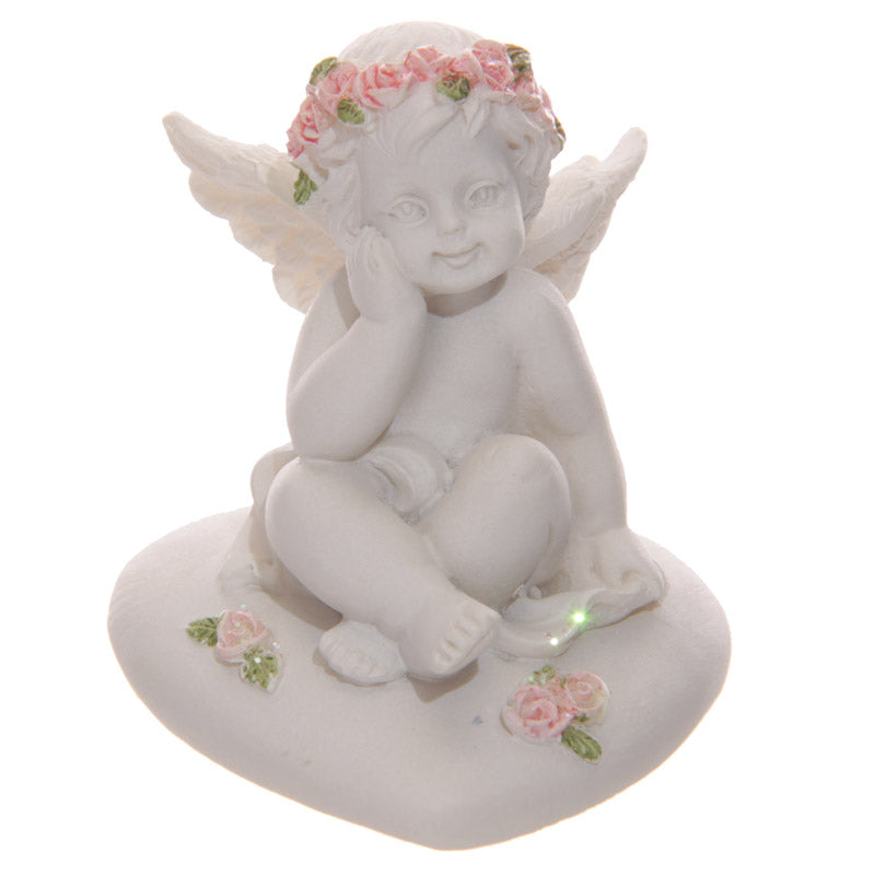 Collectable Cherub Sitting on Heart with Pink Roses - Side View