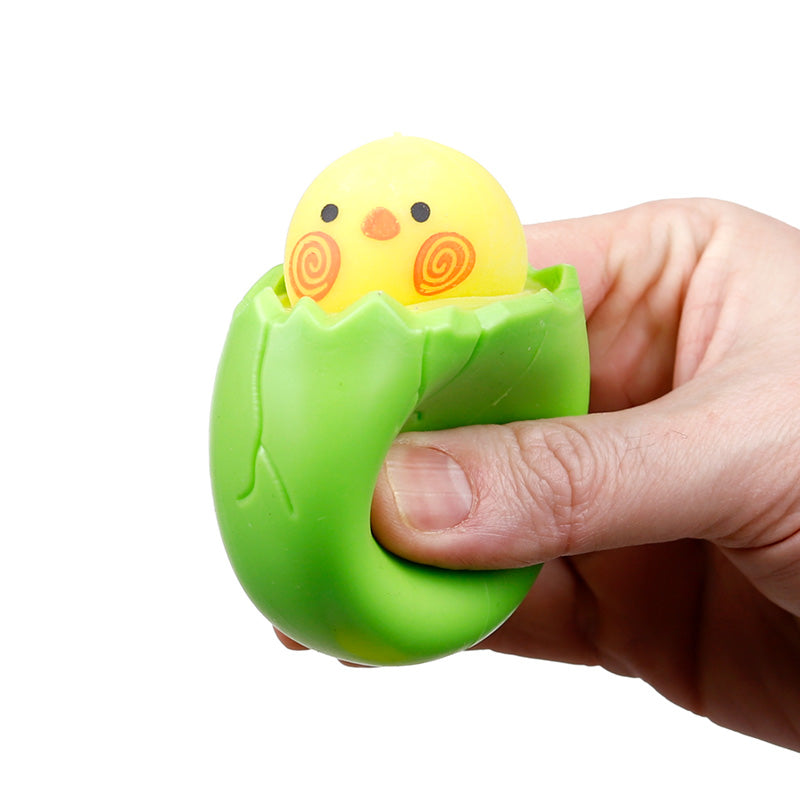 Hatching Chick & Egg Pop Out Toy displayed with seasonal decor